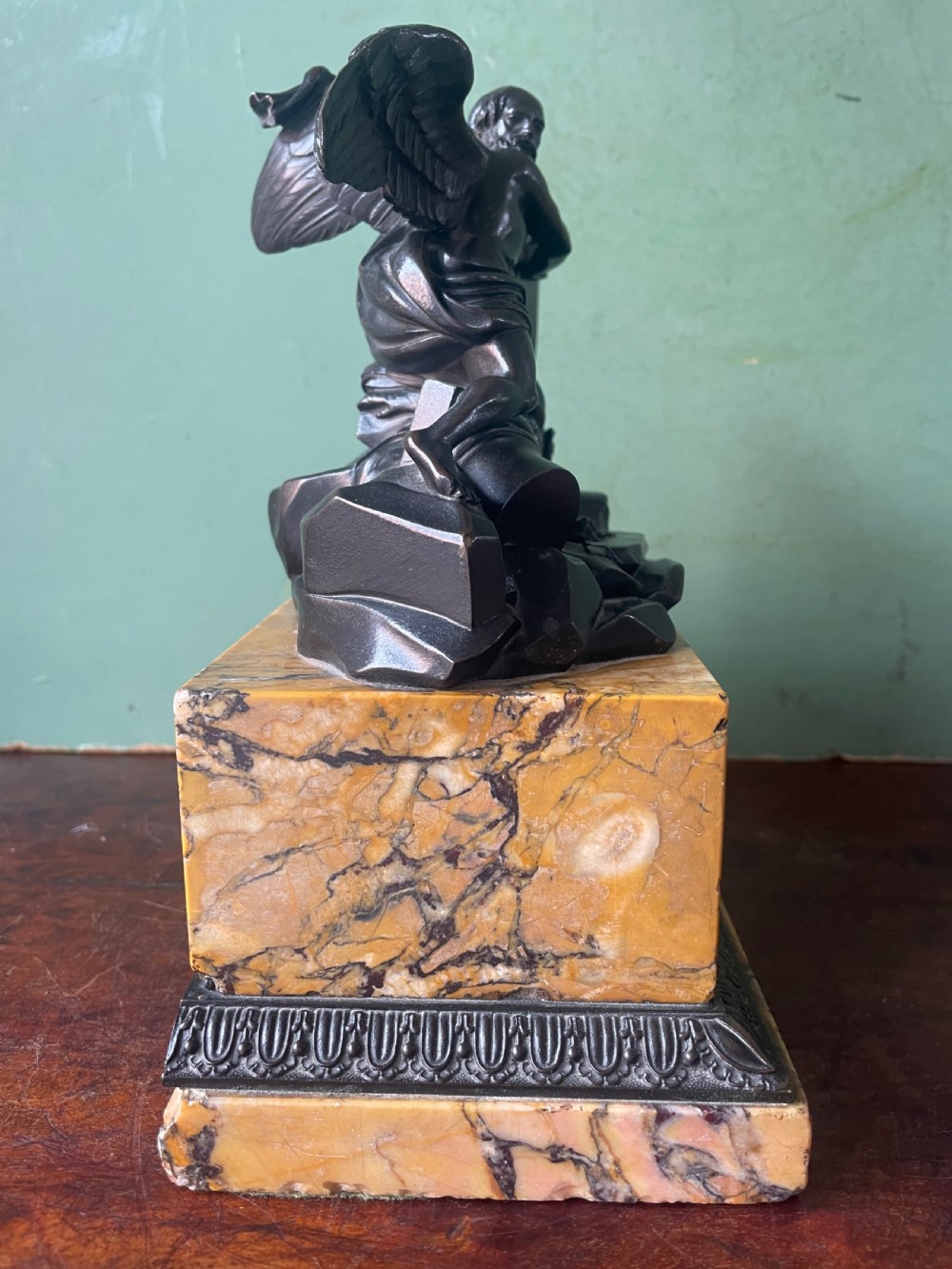 Early C19th French classical bronze study mounted on a ‘giallo di siena’ marble plinth base , probably depicting Chronos . View IX