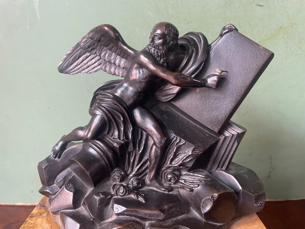 Early C19th French classical bronze study mounted on a ‘giallo di siena’ marble plinth base , probably depicting Chronos . View XIII