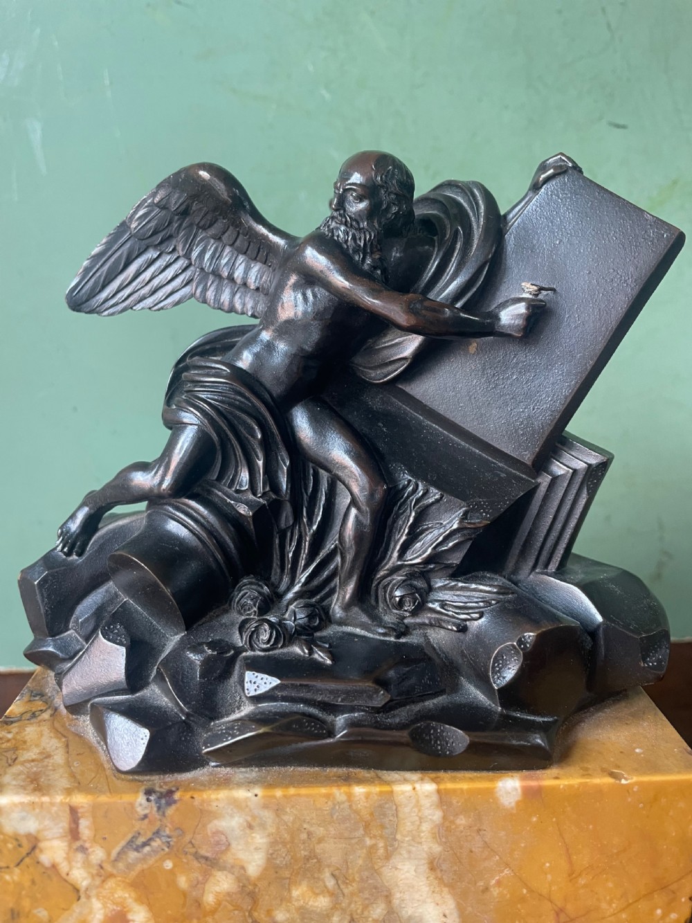 Early C19th French classical bronze study mounted on a ‘giallo di siena’ marble plinth base , probably depicting Chronos . View XVII