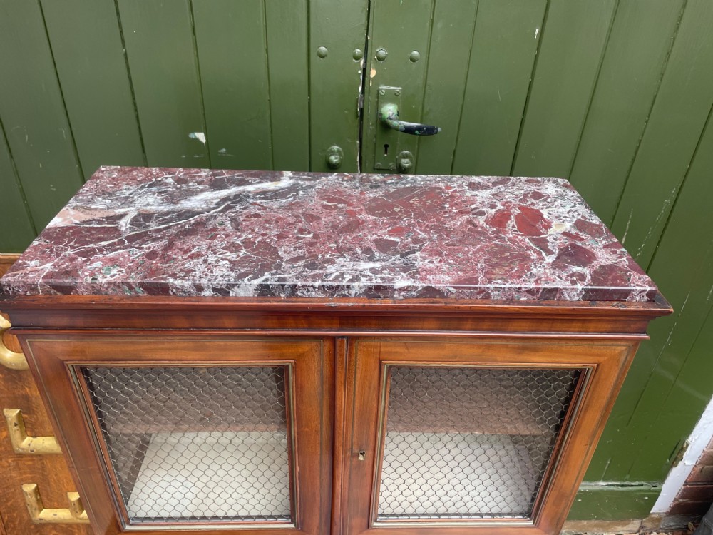 Elegant early C19th small-scale mahogany 4 door 2-part glazed cabinet having brass line inlay and brass mouldings , together with a ‘rosso levanto’ marble top. View IX