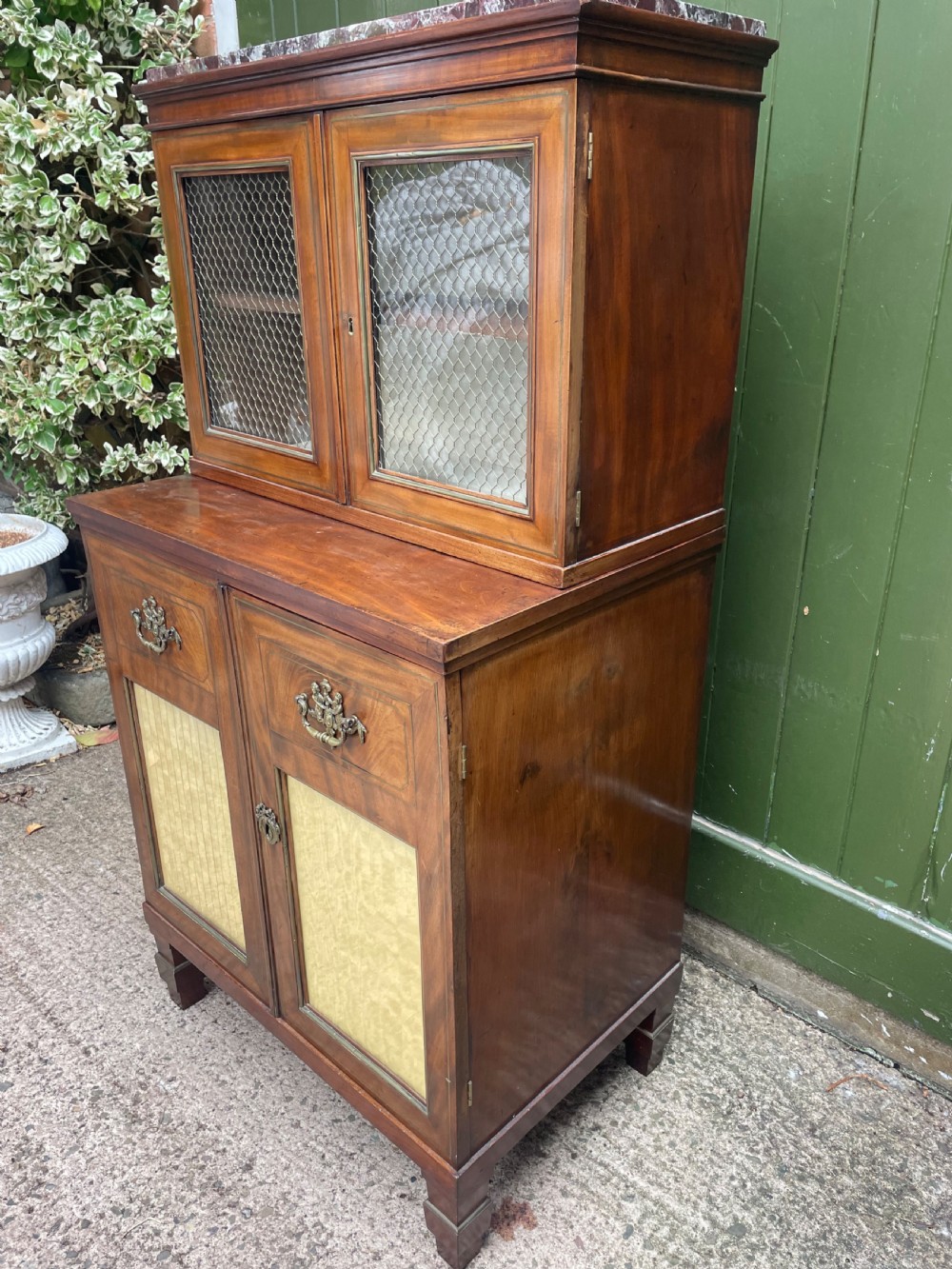 Elegant early C19th small-scale mahogany 4 door 2-part glazed cabinet having brass line inlay and brass mouldings , together with a ‘rosso levanto’ marble top. View XII