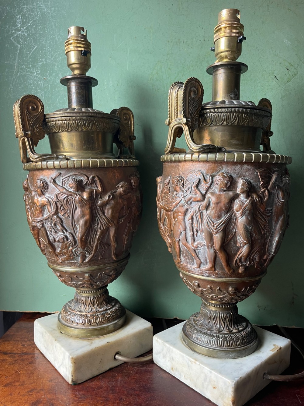 Pair of late C19th gilded and patinated brass table lamps modelled in the ‘Grand Tour’ taste in the form of ancient classical volute krater vases .  View IV
