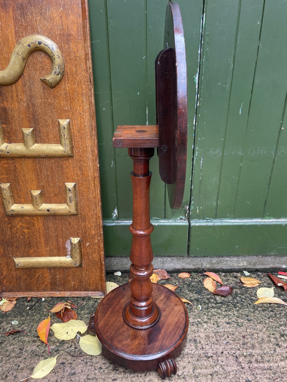 A 19th-century William IV circular occasional table featuring a geometric optical parquetry top set on a turned column stem and plinth base. View XVIII