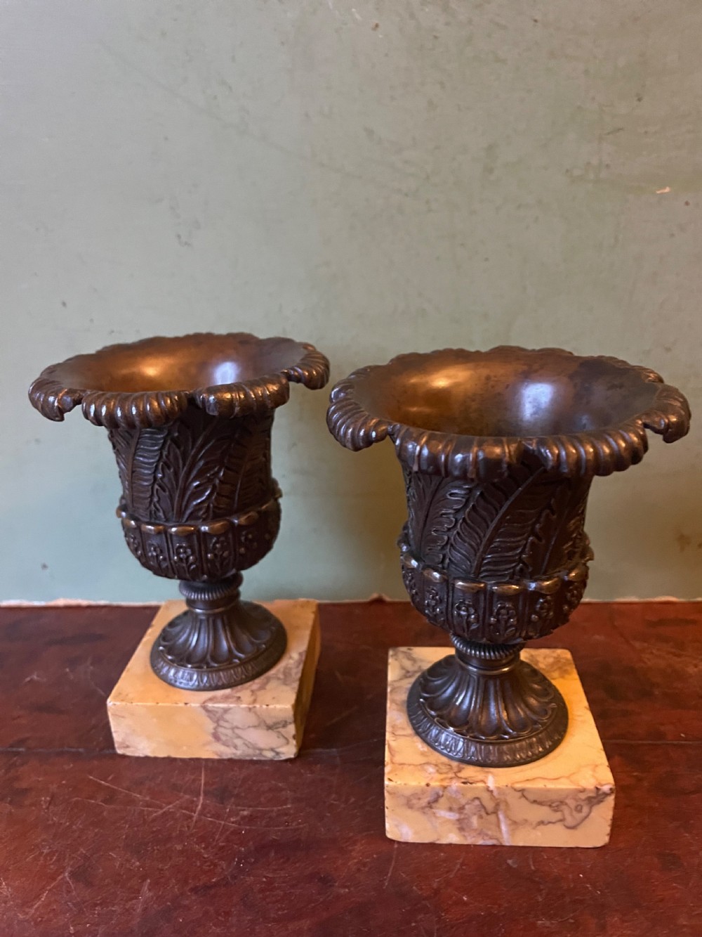 Finely cast pair of early C19th small-scale bronze classical campana-shaped vases on ‘giallo di siena’ marble block bases . View II