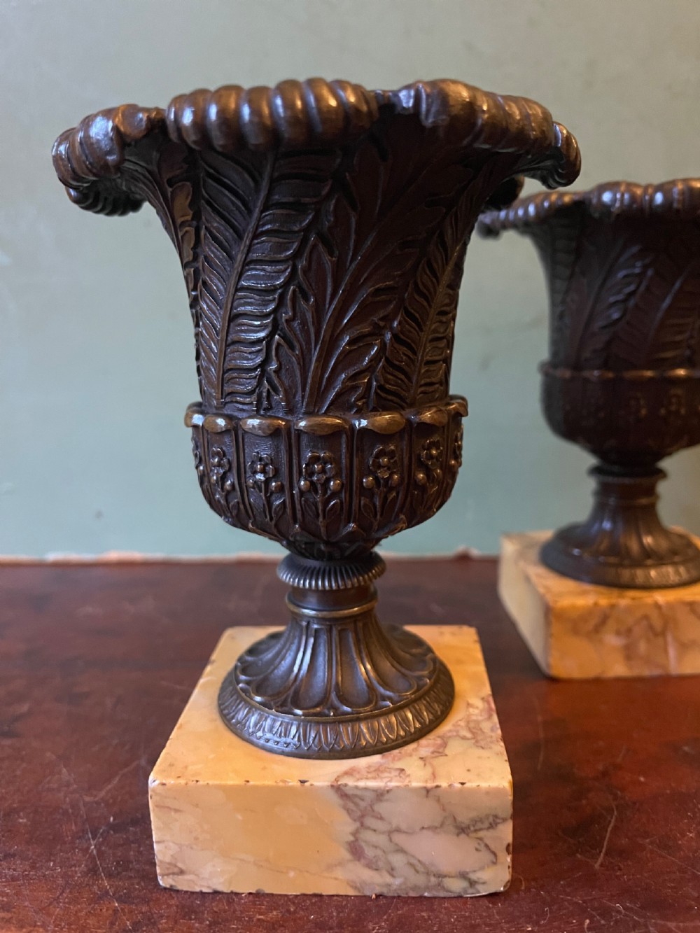 Finely cast pair of early C19th small-scale bronze classical campana-shaped vases on ‘giallo di siena’ marble block bases . View III