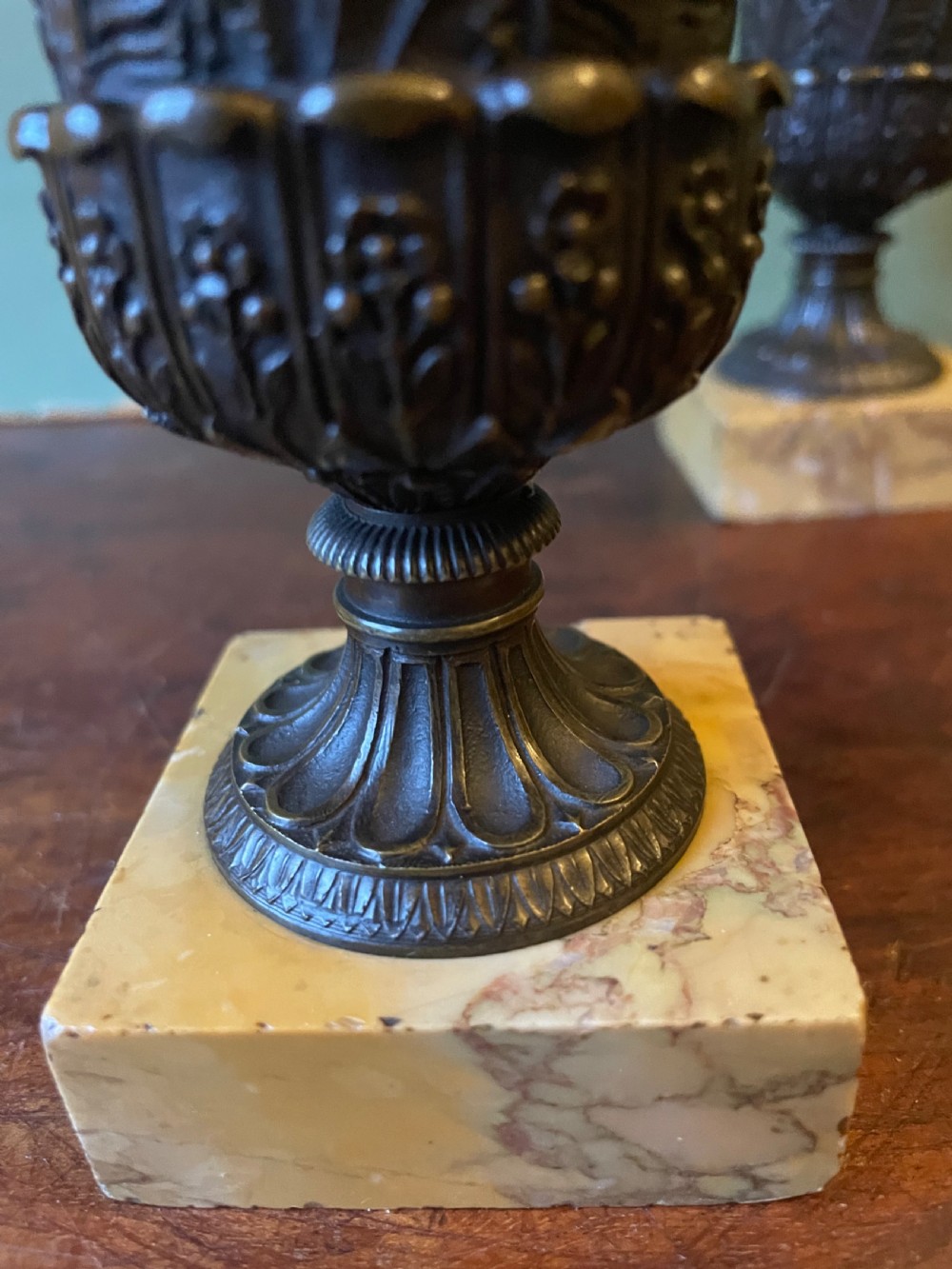 Finely cast pair of early C19th small-scale bronze classical campana-shaped vases on ‘giallo di siena’ marble block bases . View V