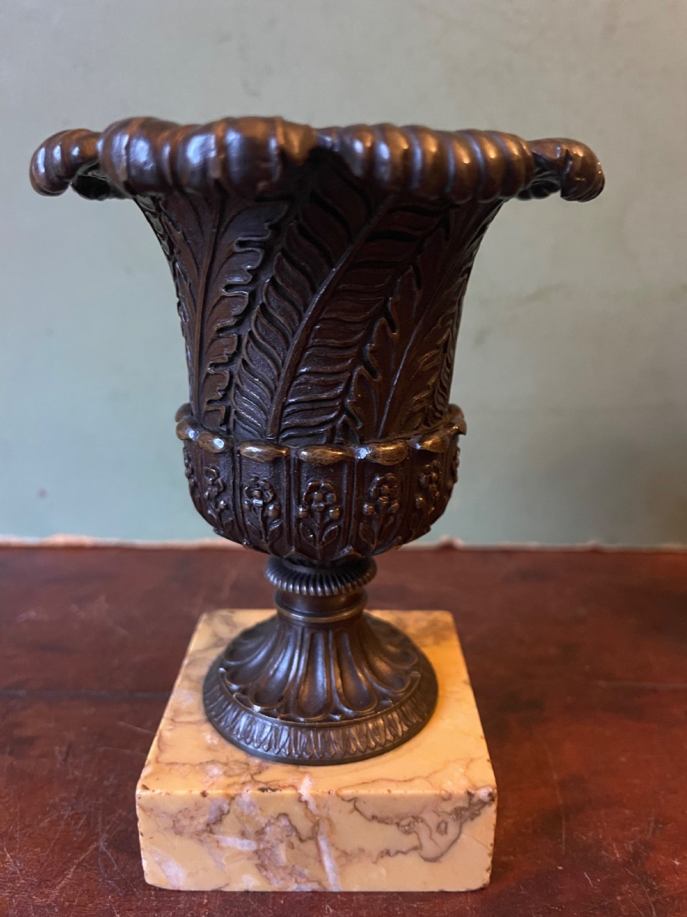 Finely cast pair of early C19th small-scale bronze classical campana-shaped vases on ‘giallo di siena’ marble block bases . View IX