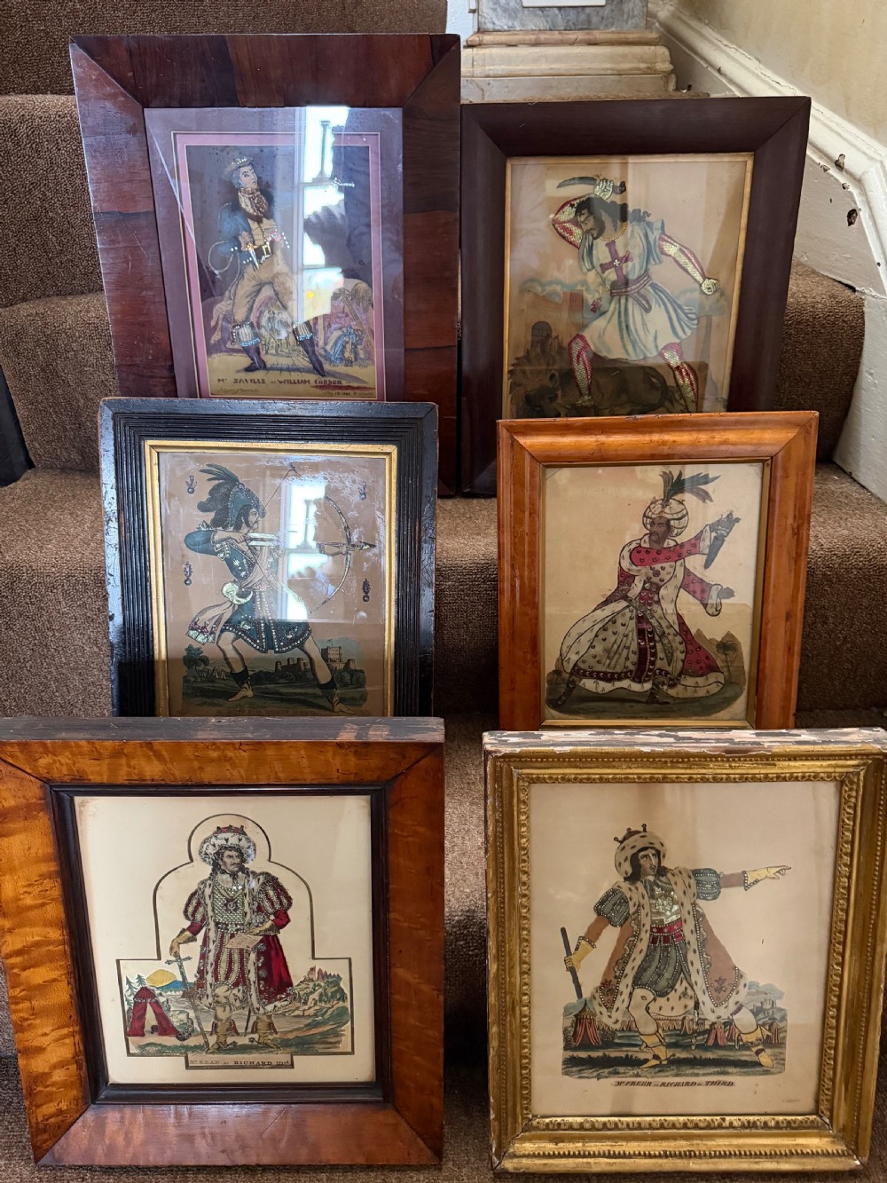 Six early to mid-19th-century framed theatrical tinsel prints displaying costumed figures within various wooden and gilt frames.