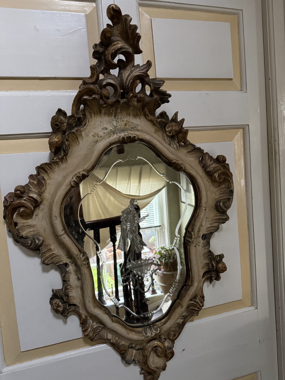 A pair of 19th-century Italian Venetian Rococo style wall mirrors featuring carved giltwood and polychrome frames surrounding etched glass depicting figures. View VI