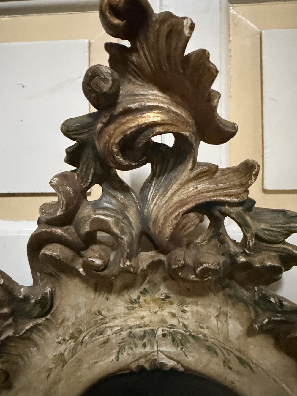 A pair of 19th-century Italian Venetian Rococo style wall mirrors featuring carved giltwood and polychrome frames surrounding etched glass depicting figures. View IX
