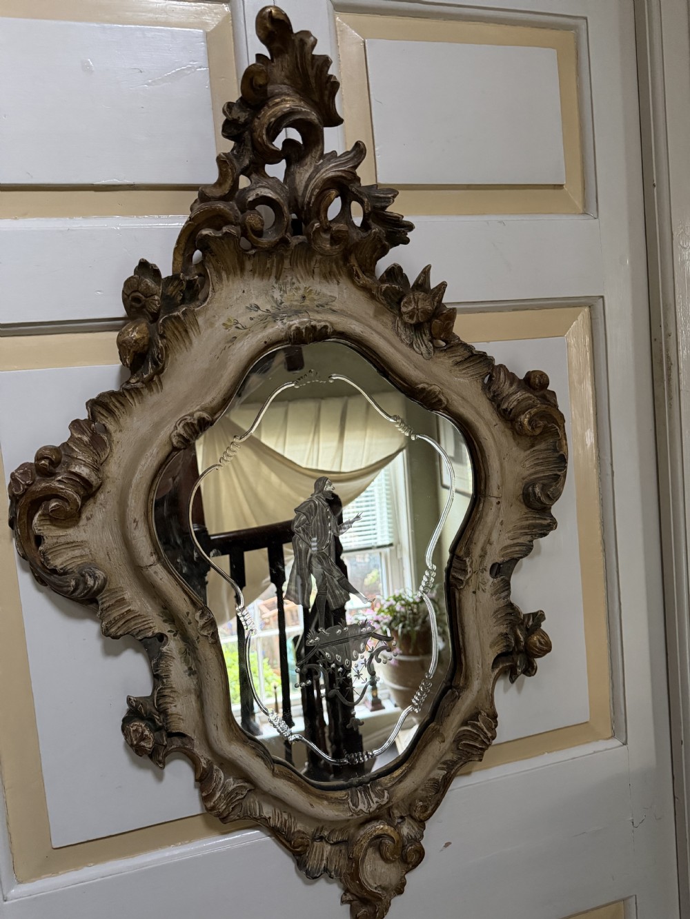 A pair of 19th-century Italian Venetian Rococo style wall mirrors featuring carved giltwood and polychrome frames surrounding etched glass depicting figures. View XVI