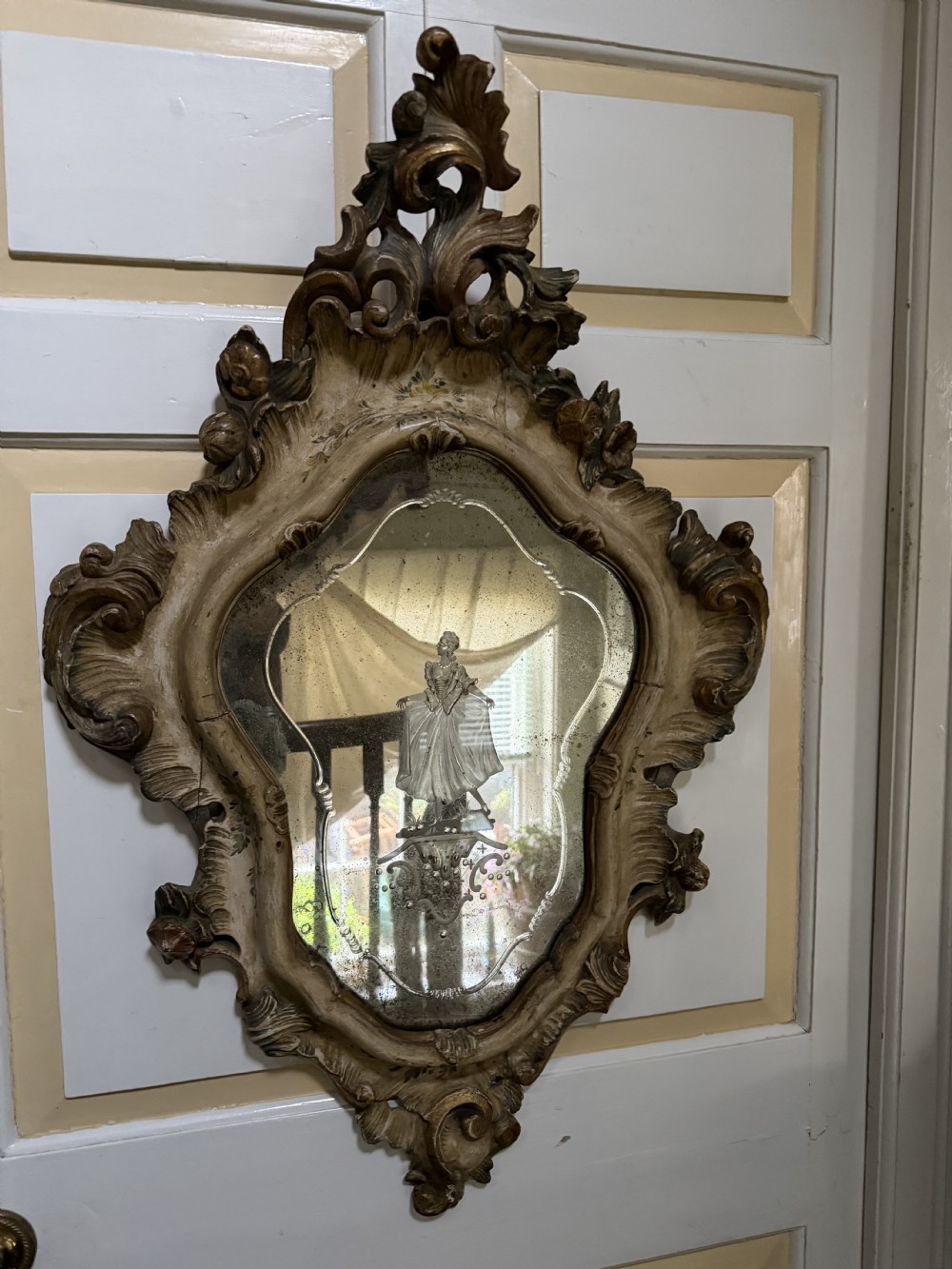 A pair of 19th-century Italian Venetian Rococo style wall mirrors featuring carved giltwood and polychrome frames surrounding etched glass depicting figures. View XVII