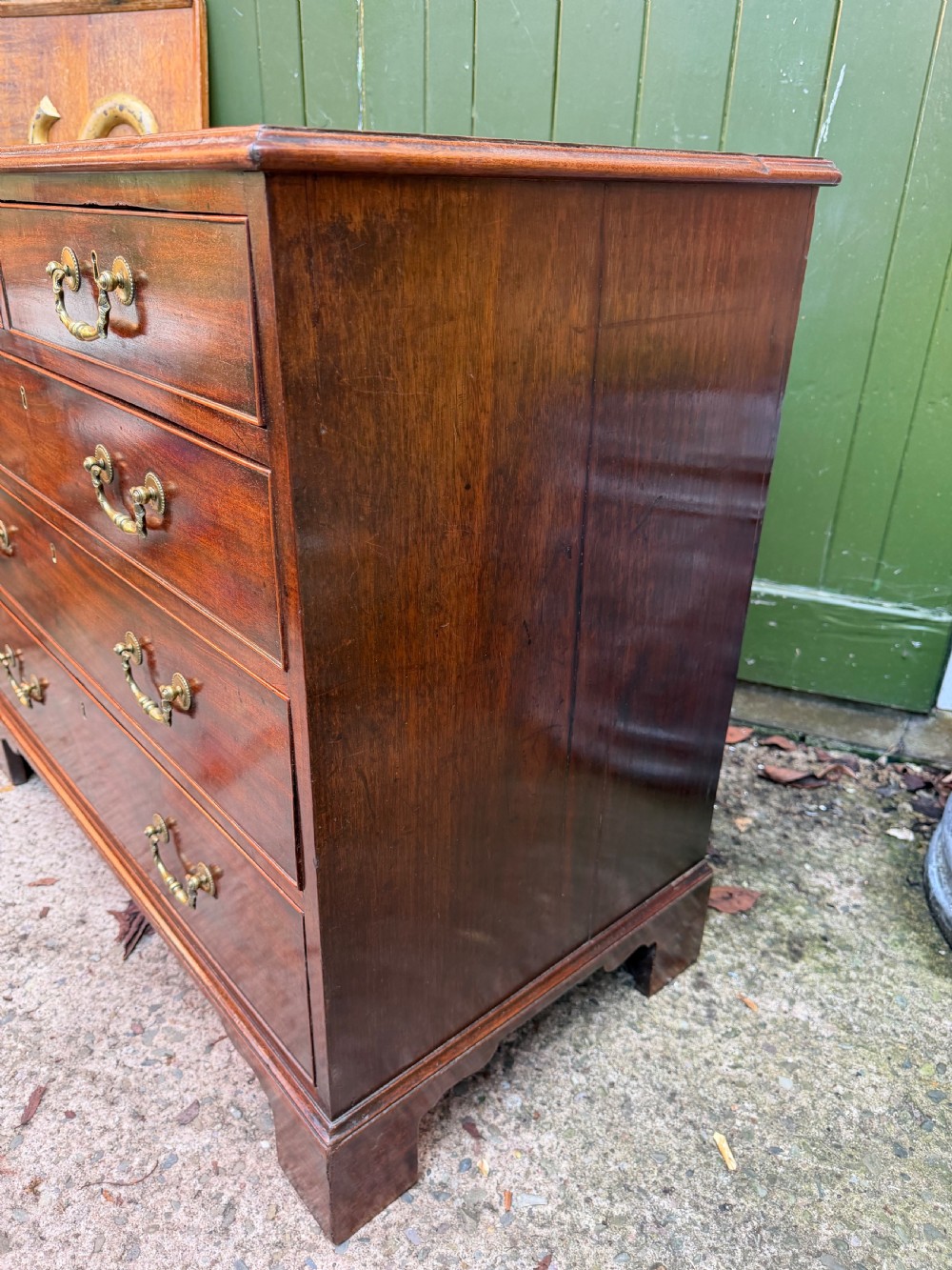 C18th George III Chippendale period mahogany chest of drawers of small scale and proportions. View VI