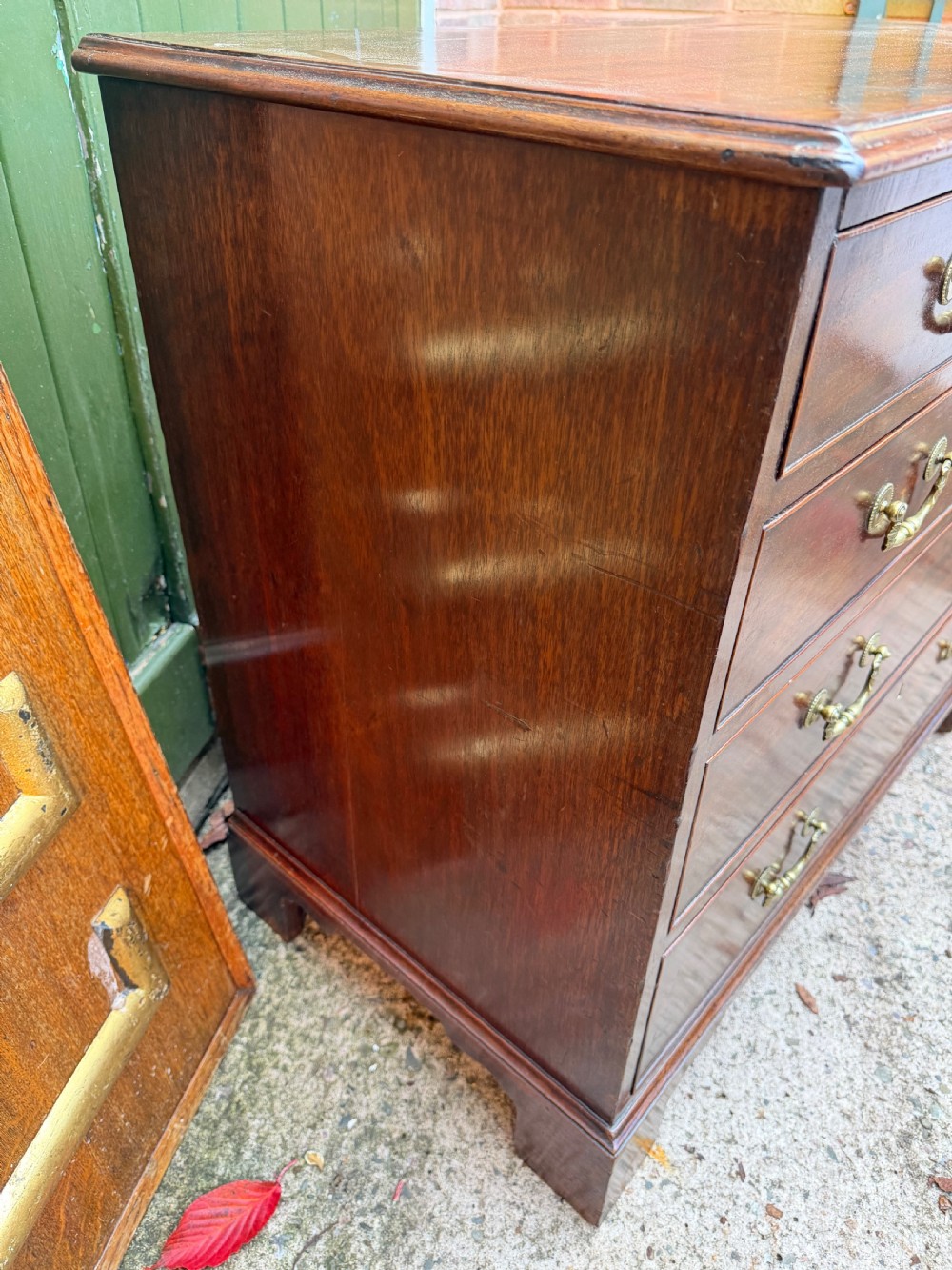 C18th George III Chippendale period mahogany chest of drawers of small scale and proportions. View VII