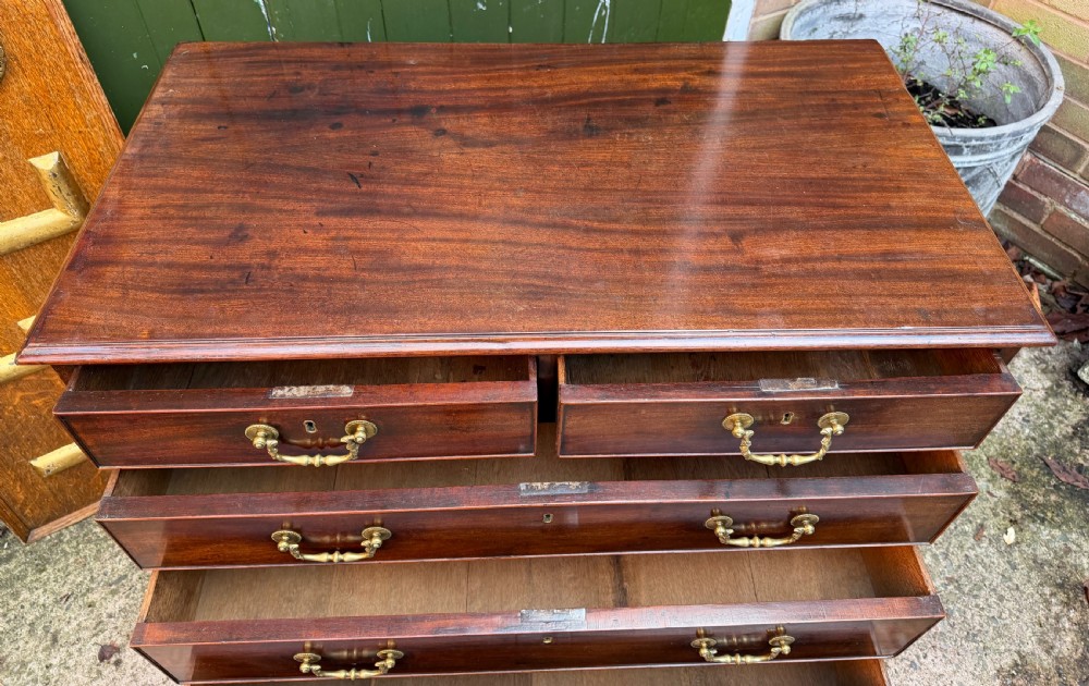 C18th George III Chippendale period mahogany chest of drawers of small scale and proportions. View X