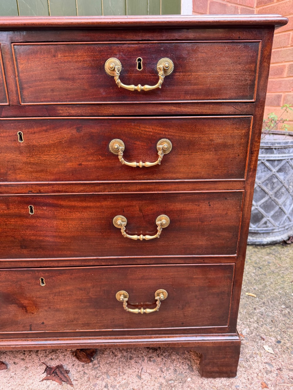 C18th George III Chippendale period mahogany chest of drawers of small scale and proportions. View XII