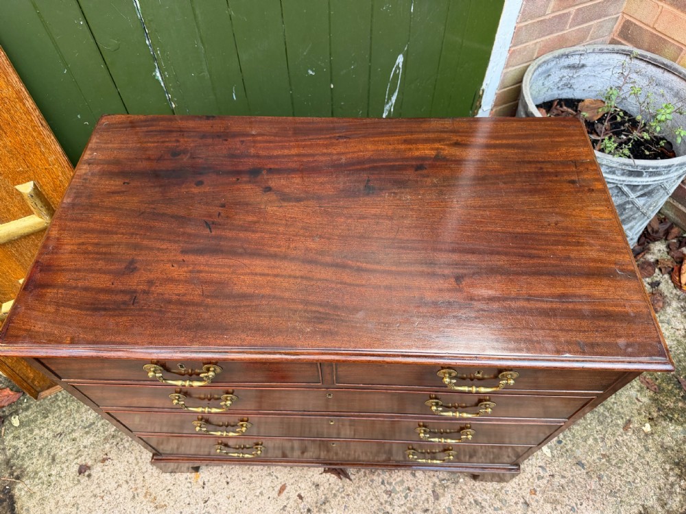 C18th George III Chippendale period mahogany chest of drawers of small scale and proportions. View XIV