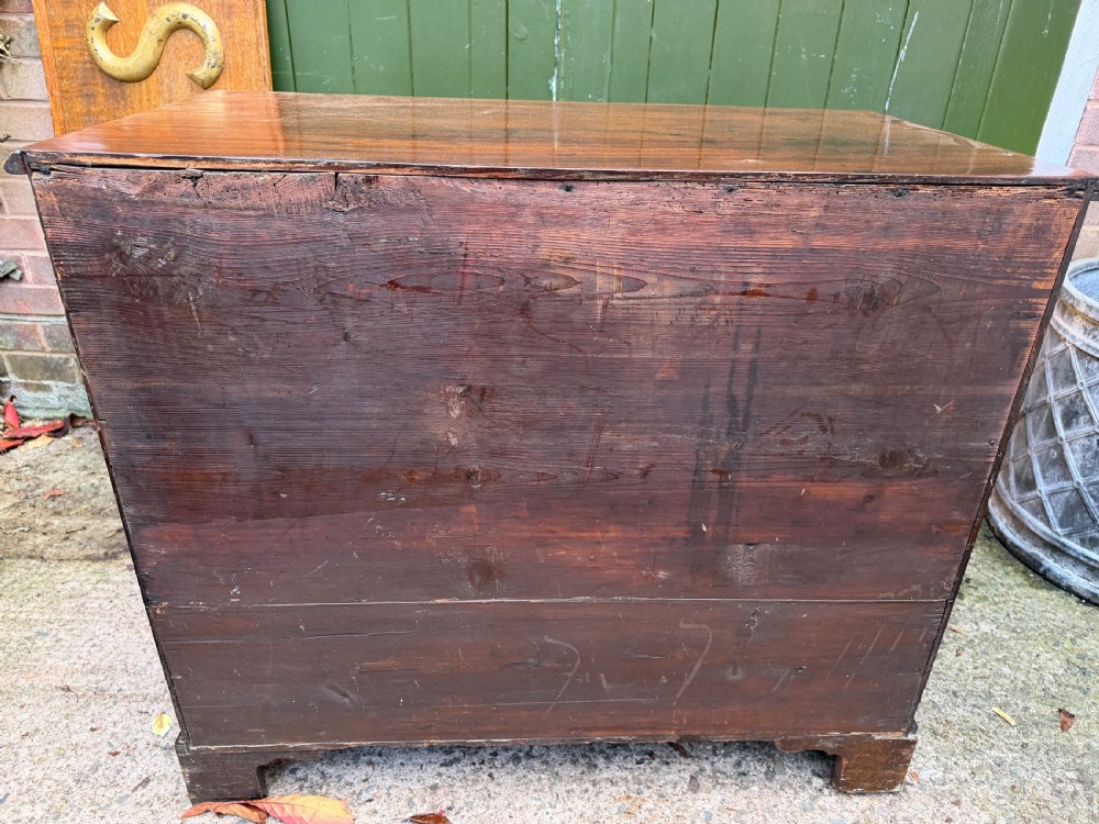 C18th George III Chippendale period mahogany chest of drawers of small scale and proportions. View XVIII