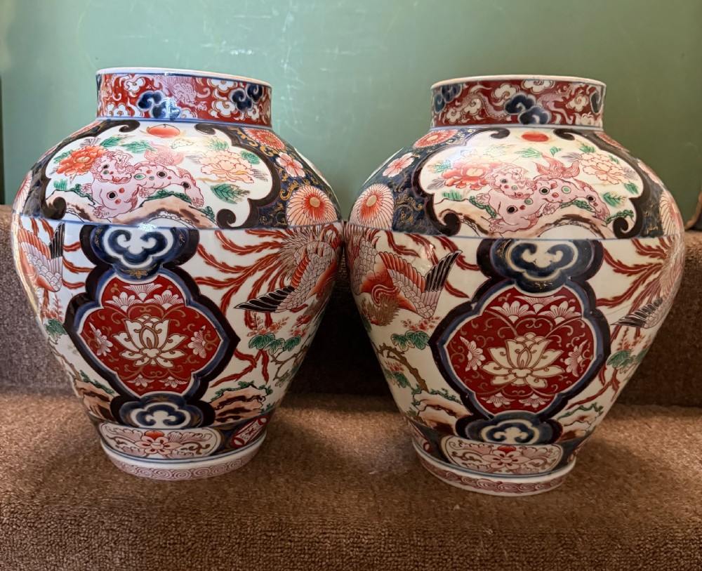 Pair of late C17th / early C18th Japanese Genroku period vases decorated in the Imari palette. View II