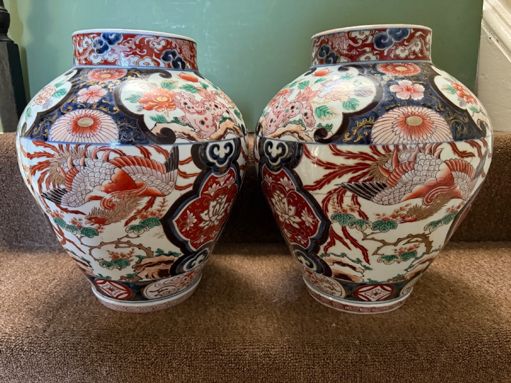 Pair of late C17th / early C18th Japanese Genroku period vases decorated in the Imari palette. View III