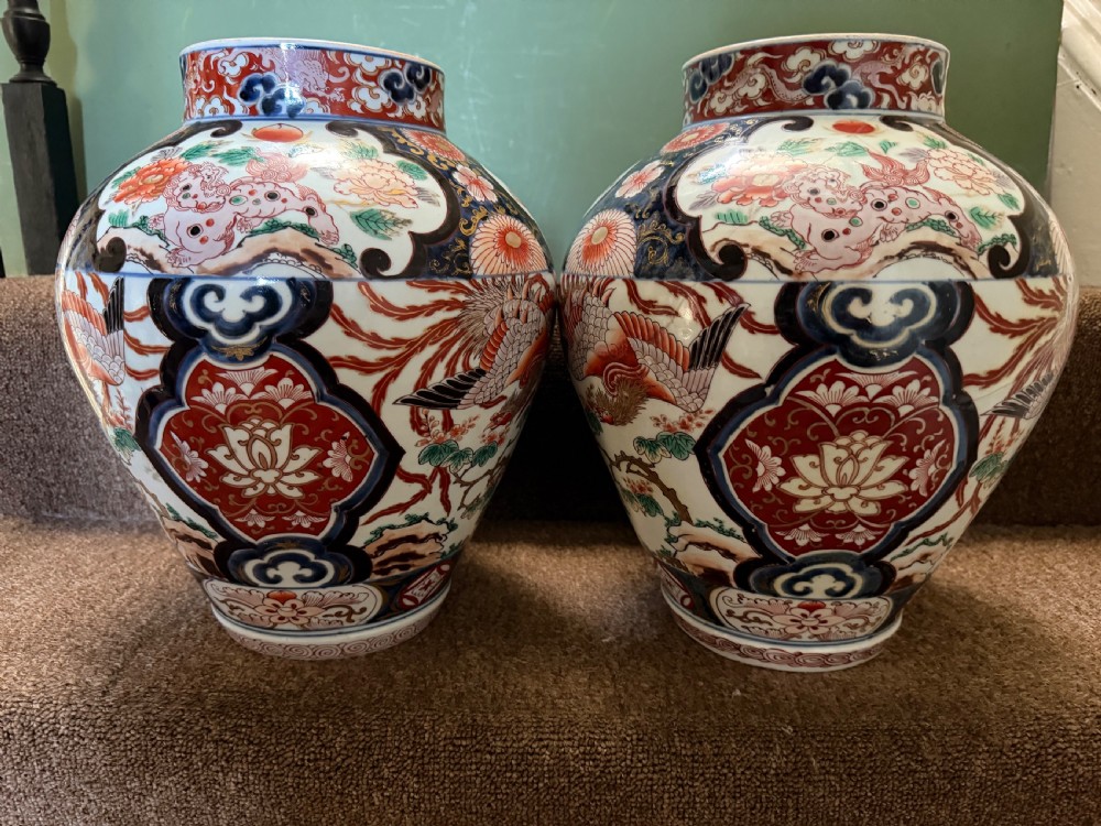 Pair of late C17th / early C18th Japanese Genroku period vases decorated in the Imari palette. View V
