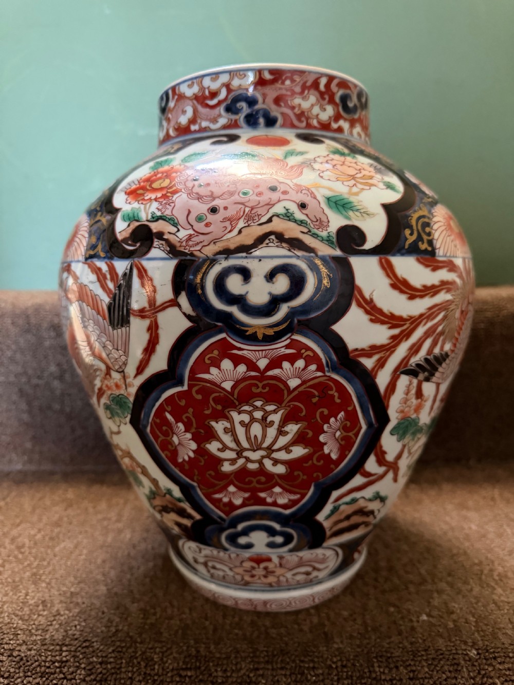 Pair of late C17th / early C18th Japanese Genroku period vases decorated in the Imari palette. View X