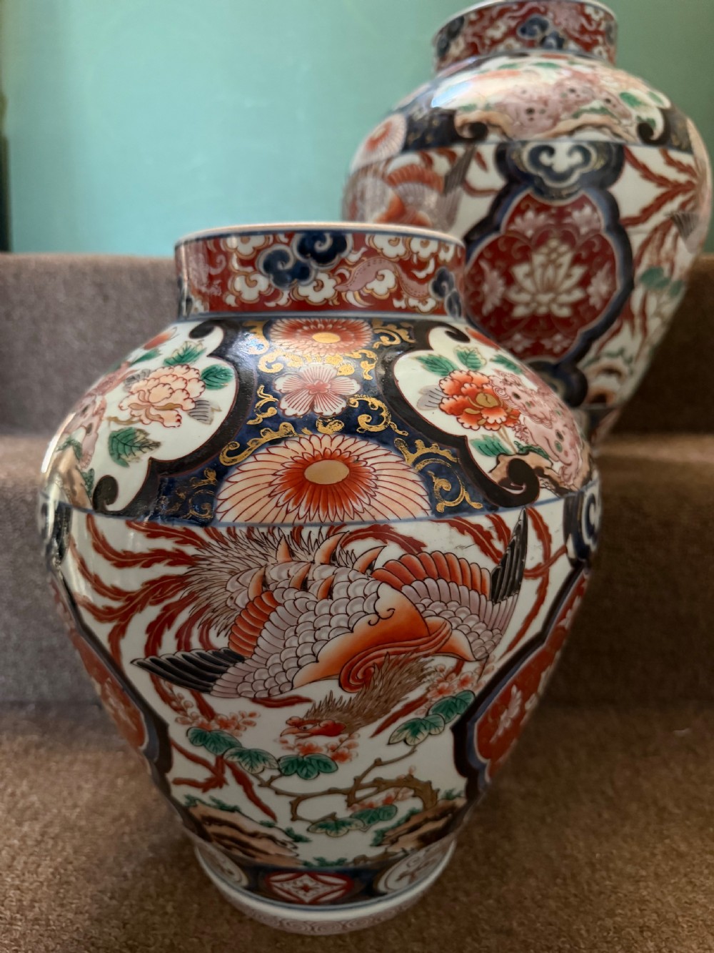 Pair of late C17th / early C18th Japanese Genroku period vases decorated in the Imari palette. View XIX