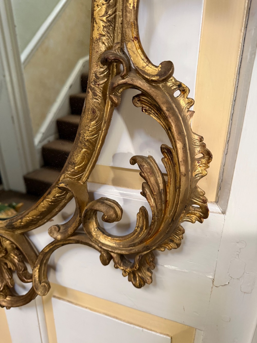 Flamboyant early C20th carved gilt-wood and composition rococo-style framed oval mirror of C18th period design in the manner of Thomas Chippendale. View XIII