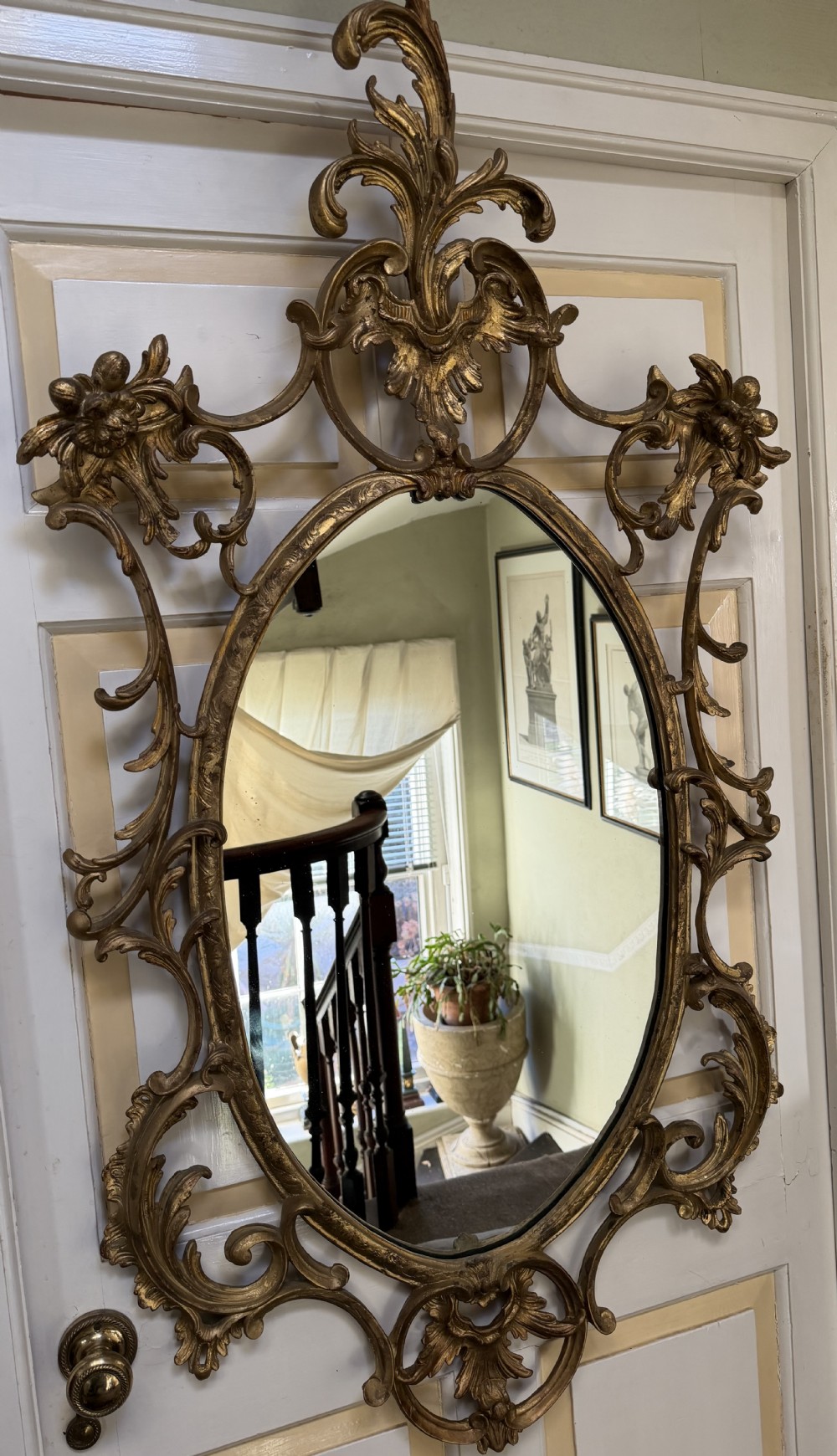 Flamboyant early C20th carved gilt-wood and composition rococo-style framed oval mirror of C18th period design in the manner of Thomas Chippendale. View XIX