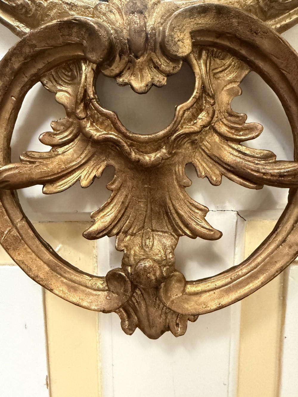 Flamboyant early C20th carved gilt-wood and composition rococo-style framed oval mirror of C18th period design in the manner of Thomas Chippendale. View XXI