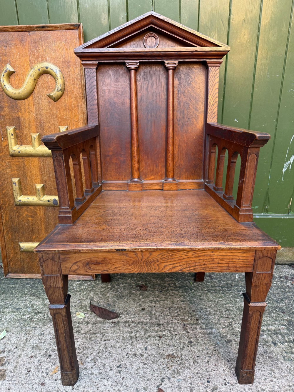 Interesting mid C19th oak armchair with an architectural ‘Palladian’ style classical back back . 