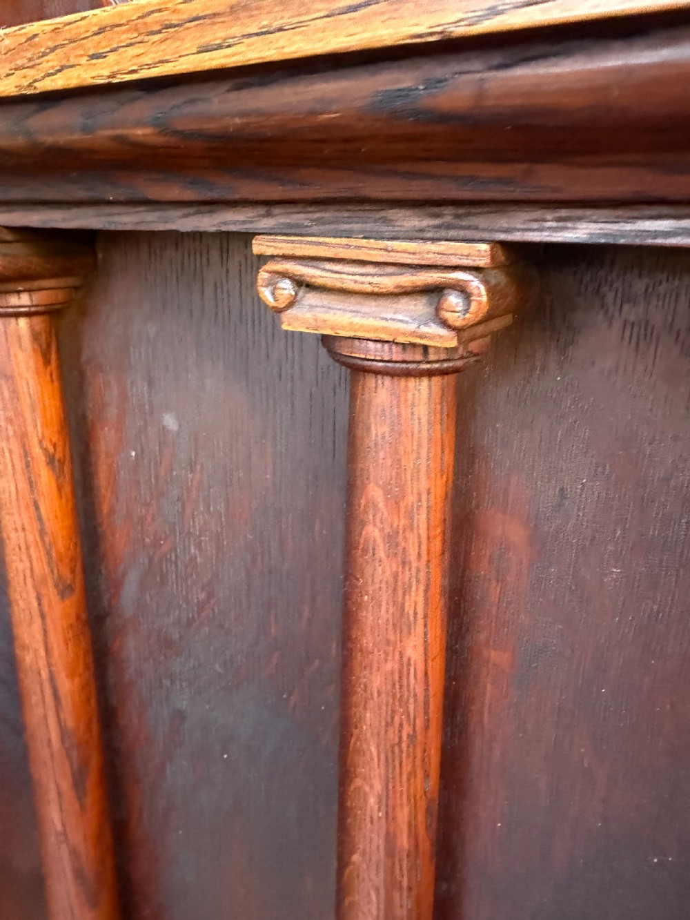 Interesting mid C19th oak armchair with an architectural ‘Palladian’ style classical back back .  View III