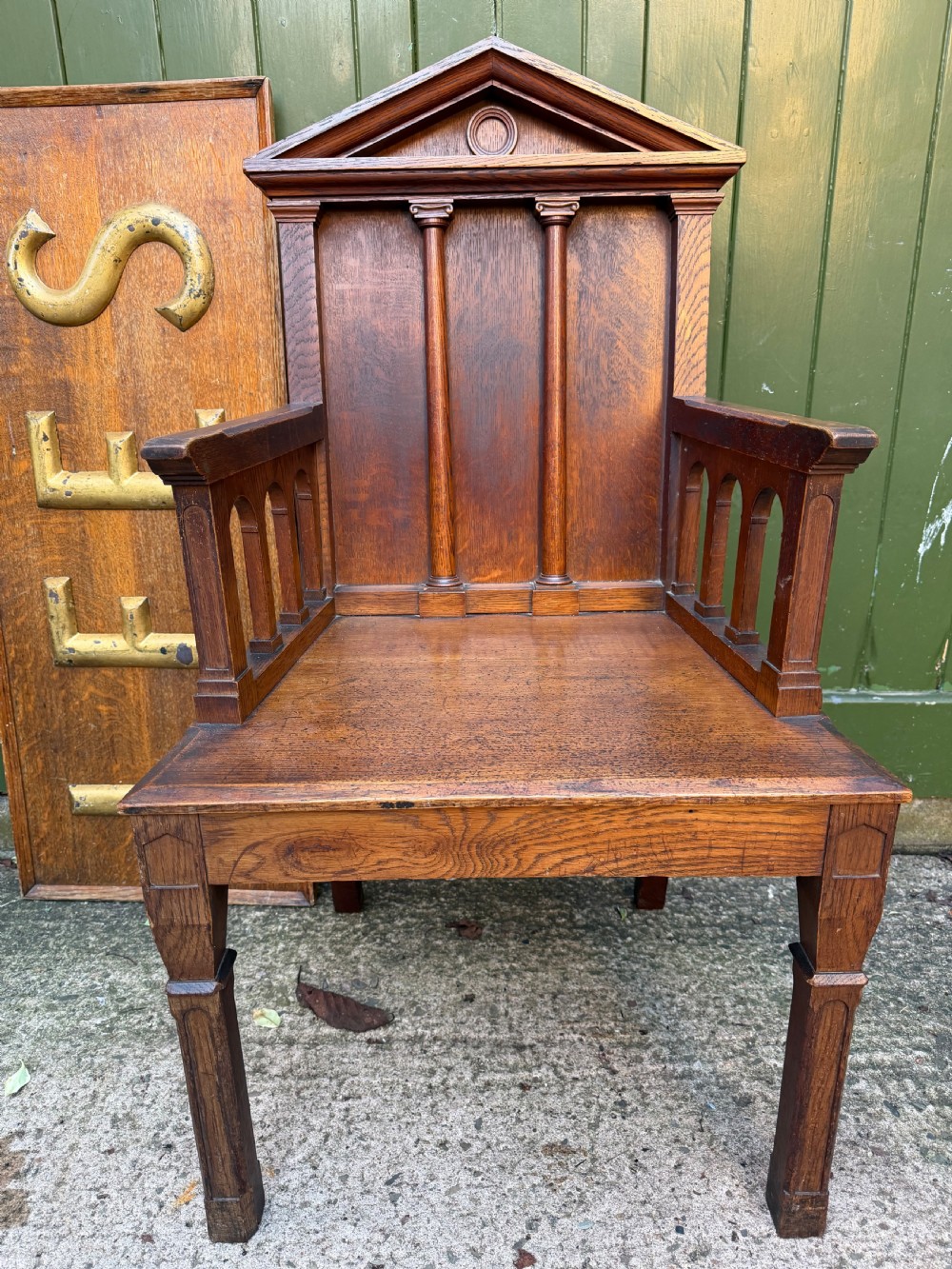 Interesting mid C19th oak armchair with an architectural ‘Palladian’ style classical back back .  View IV