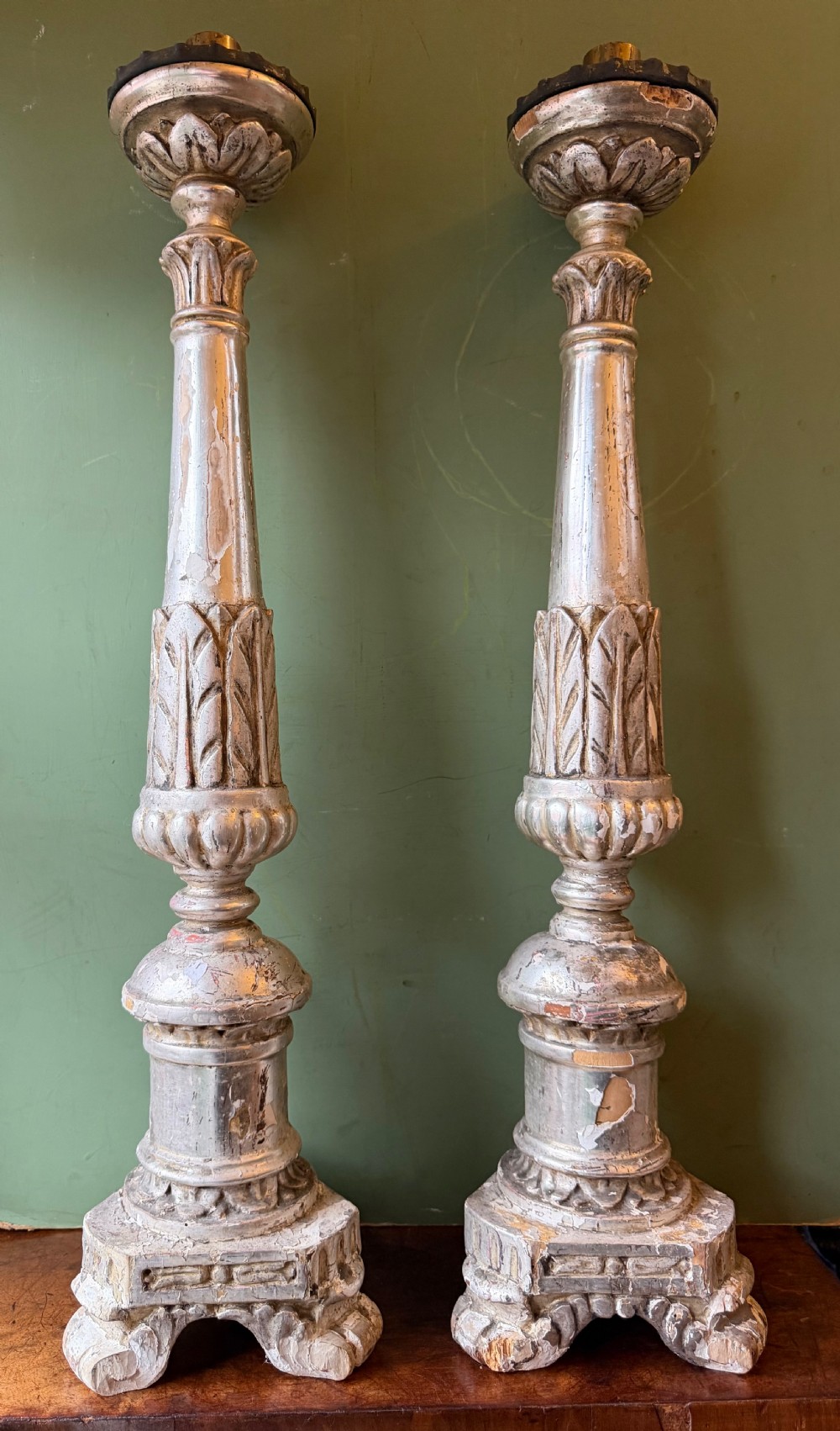 Pair of late C18th / early C19th Italian silvered carved wooden altar-style candle-sticks.