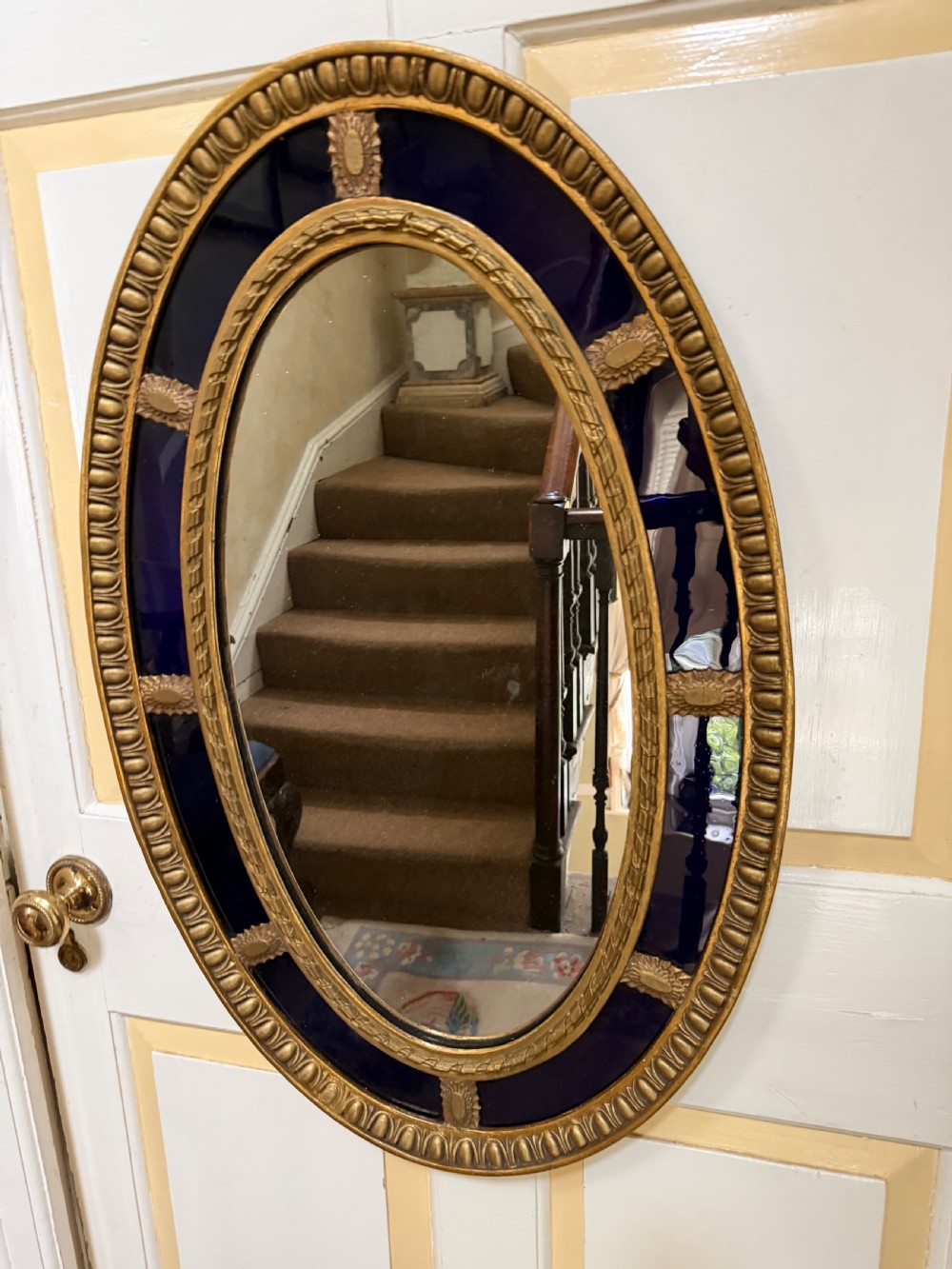 Decorative early C20th blue border glass oval gilt-wood framed mirror in the late C18th style . View IV