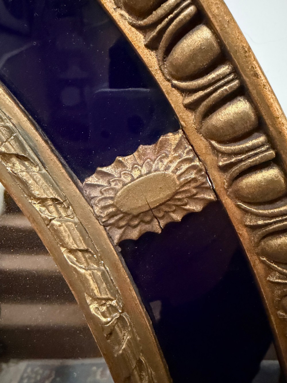 Decorative early C20th blue border glass oval gilt-wood framed mirror in the late C18th style . View VI