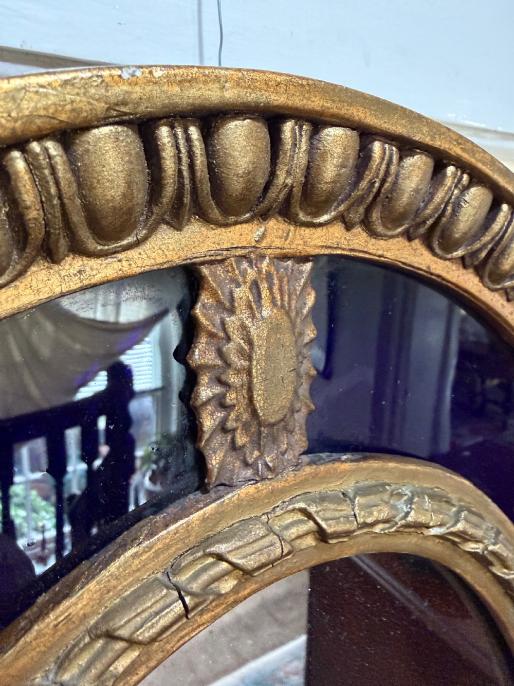 Decorative early C20th blue border glass oval gilt-wood framed mirror in the late C18th style . View X