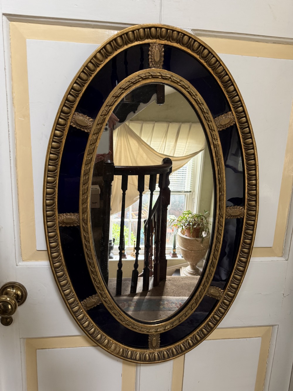 Decorative early C20th blue border glass oval gilt-wood framed mirror in the late C18th style . View XII