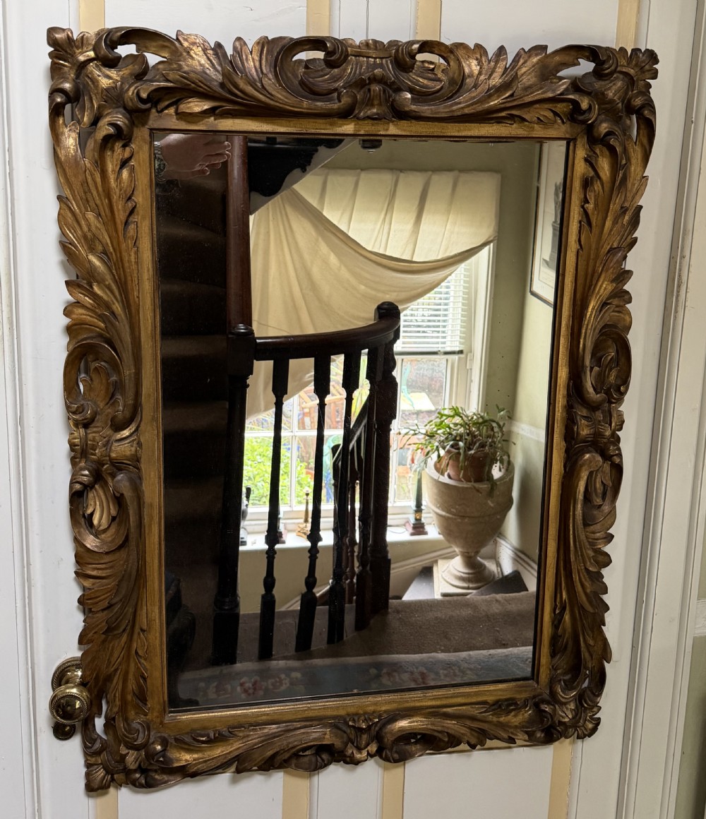 Late C18th Italian Florentine design carved giltwood framed mirror of larger scale and proportions. View VIII