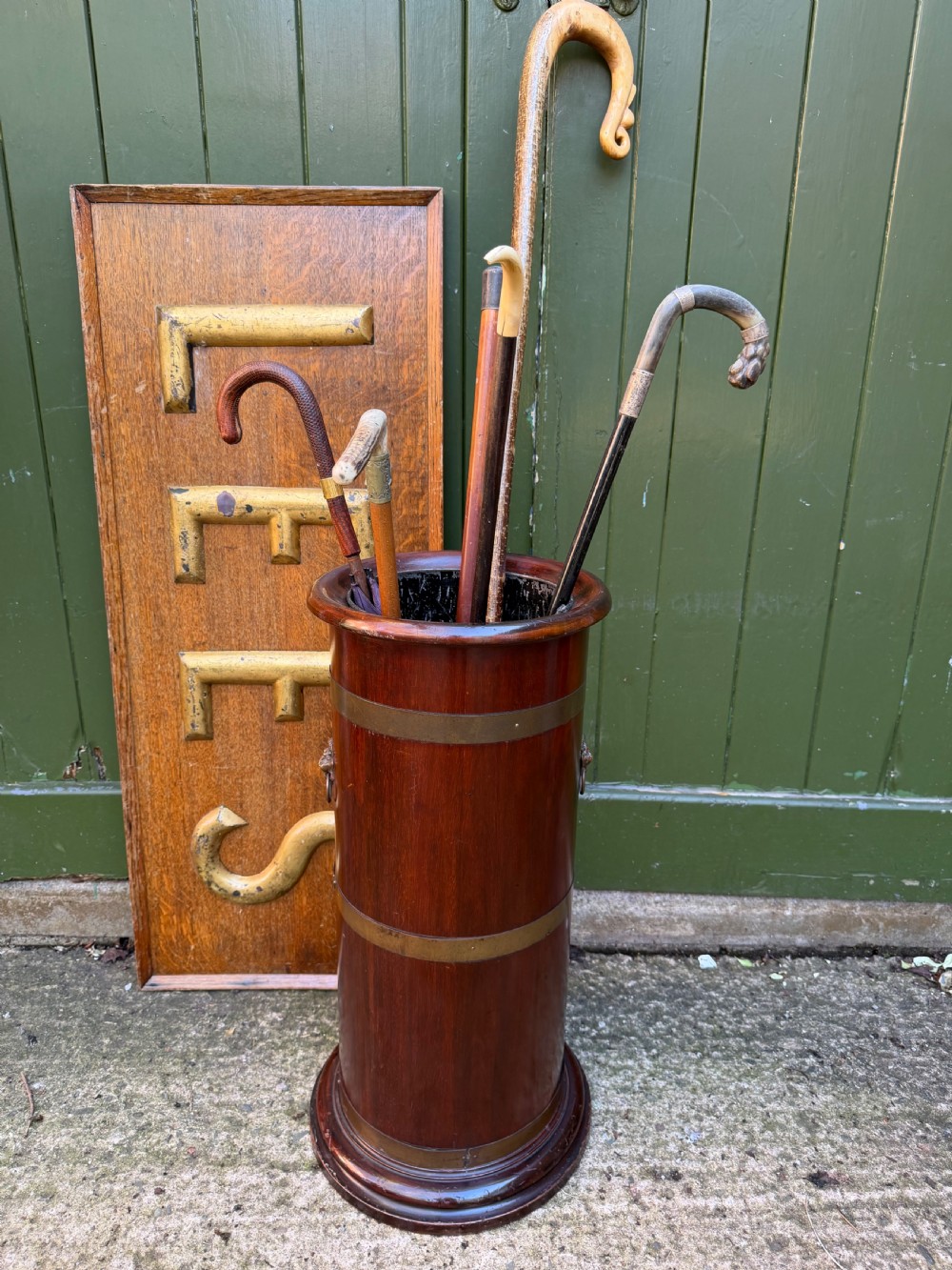 Mid C19th brass-bound mahogany cylindrical stick and umbrella stand .  View IX