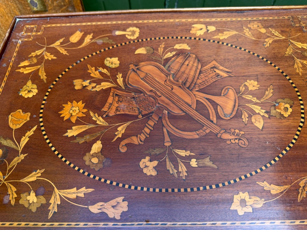 A Dutch mahogany bedside cupboard featuring floral marquetry inlays, a tambour slatted door, a single lower drawer with brass handles, and square tapered legs. View VIII