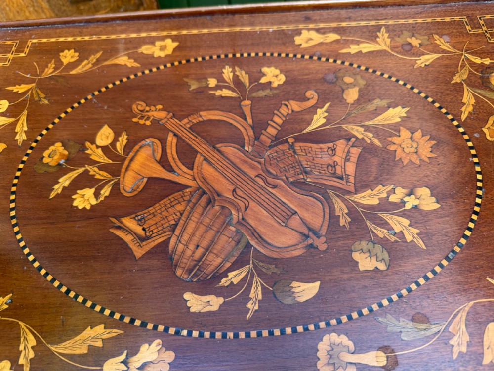 A Dutch mahogany bedside cupboard featuring floral marquetry inlays, a tambour slatted door, a single lower drawer with brass handles, and square tapered legs. View XIII