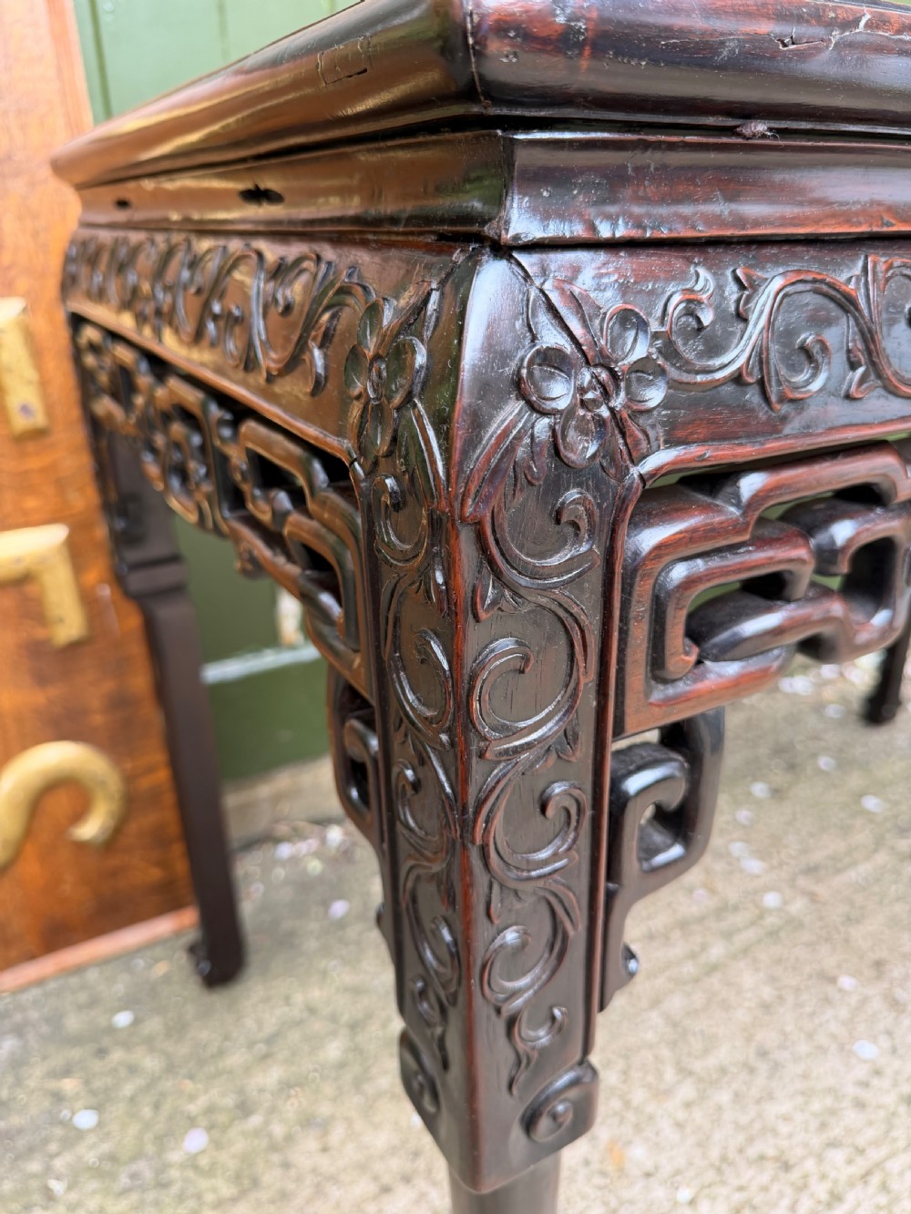 Late 19th-century Chinese Qing Dynasty dark hardwood centre table featuring an inset pink rouge marble rectangular top and intricately carved fretwork aprons. View III