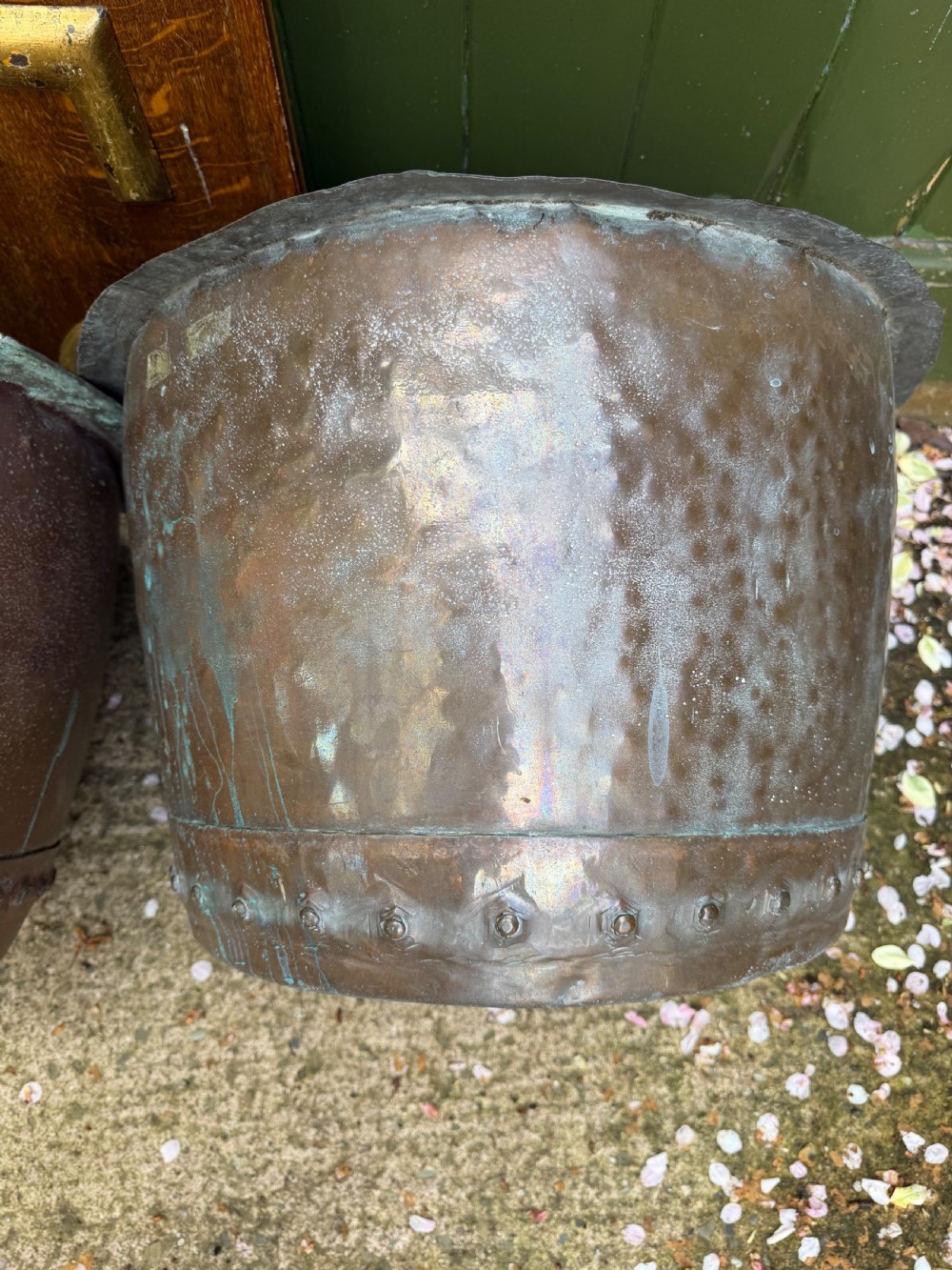 A matched pair of 19th-century copper wash tubs with riveted seams, wide rolled rims, and natural verdigris oxidisation. View XVII