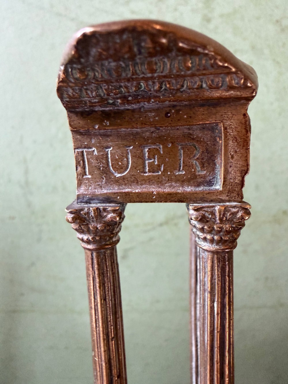 A set of three late 19th-century miniature polished bronze models representing ancient Roman temple ruins mounted on green marble bases. View XIII