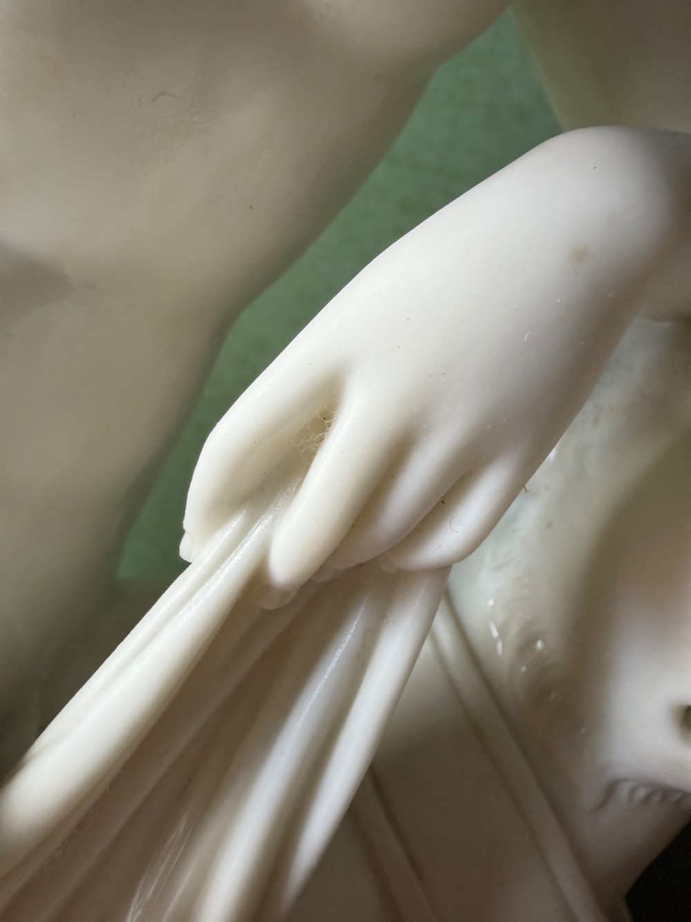 A white Parian porcelain Neoclassical sculpture depicting a reclining female figure mounted on the back of a panther on a rectangular plinth. View XV