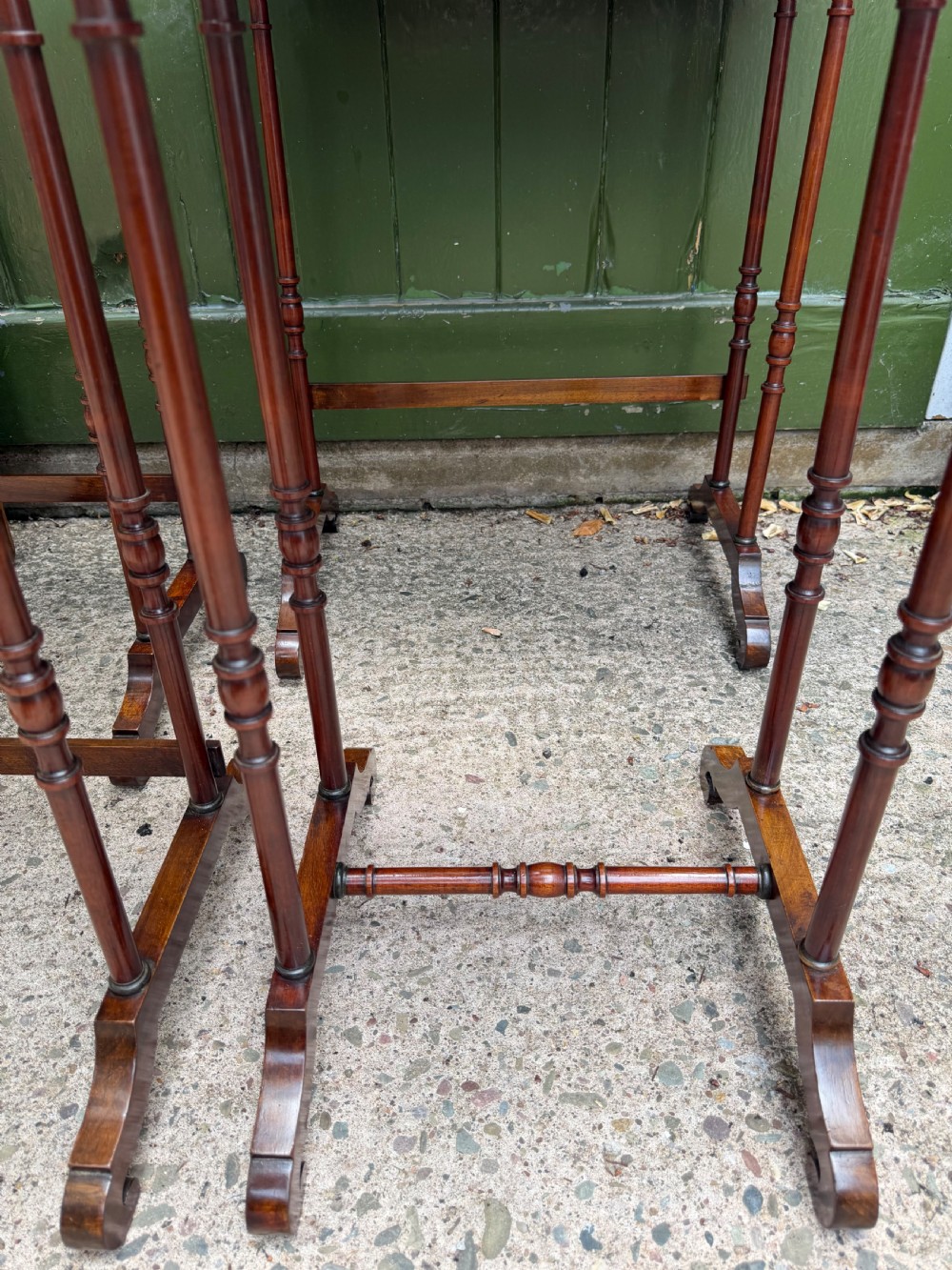 An early nineteenth-century Regency quartetto set of four rosewood nesting tables with brass line inlay and slender turned legs. View XIV