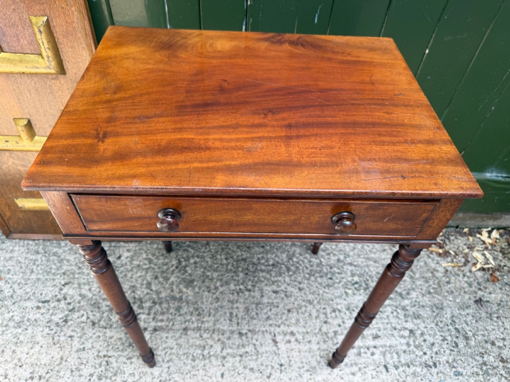 An early 19th-century George III period rectangular mahogany side table featuring a single drawer with turned wood handles and slender ring-turned legs. View VIII