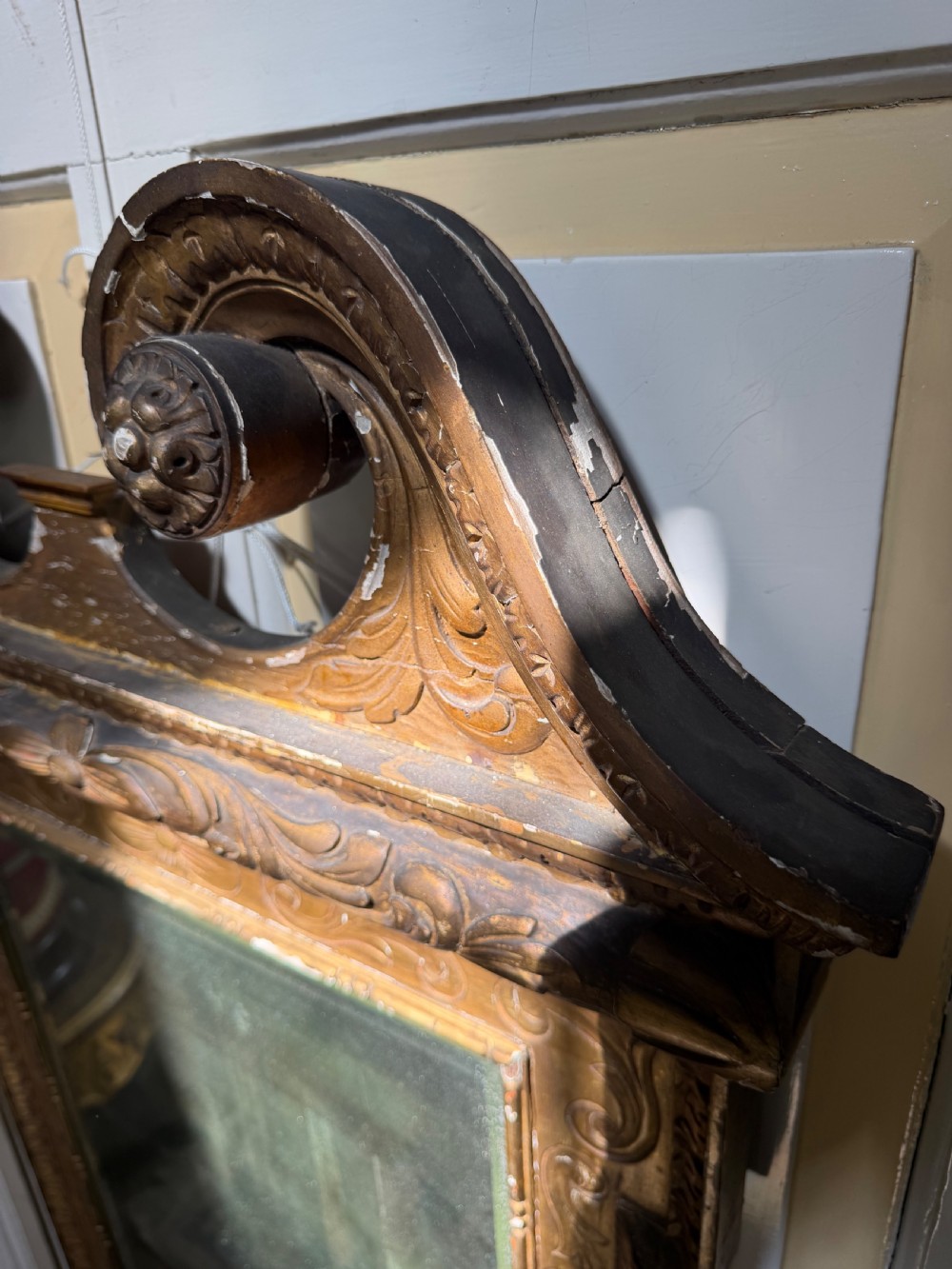 Mid 19th-century George II style carved giltwood pier mirror featuring a swan-neck pediment and carved shell apron. View VII