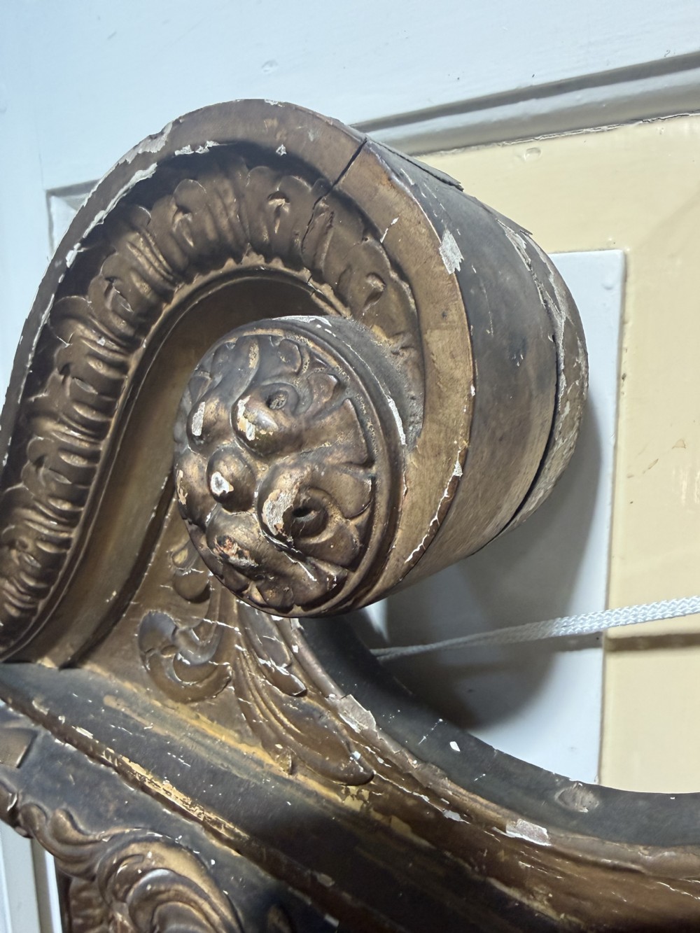 Mid 19th-century George II style carved giltwood pier mirror featuring a swan-neck pediment and carved shell apron. View X